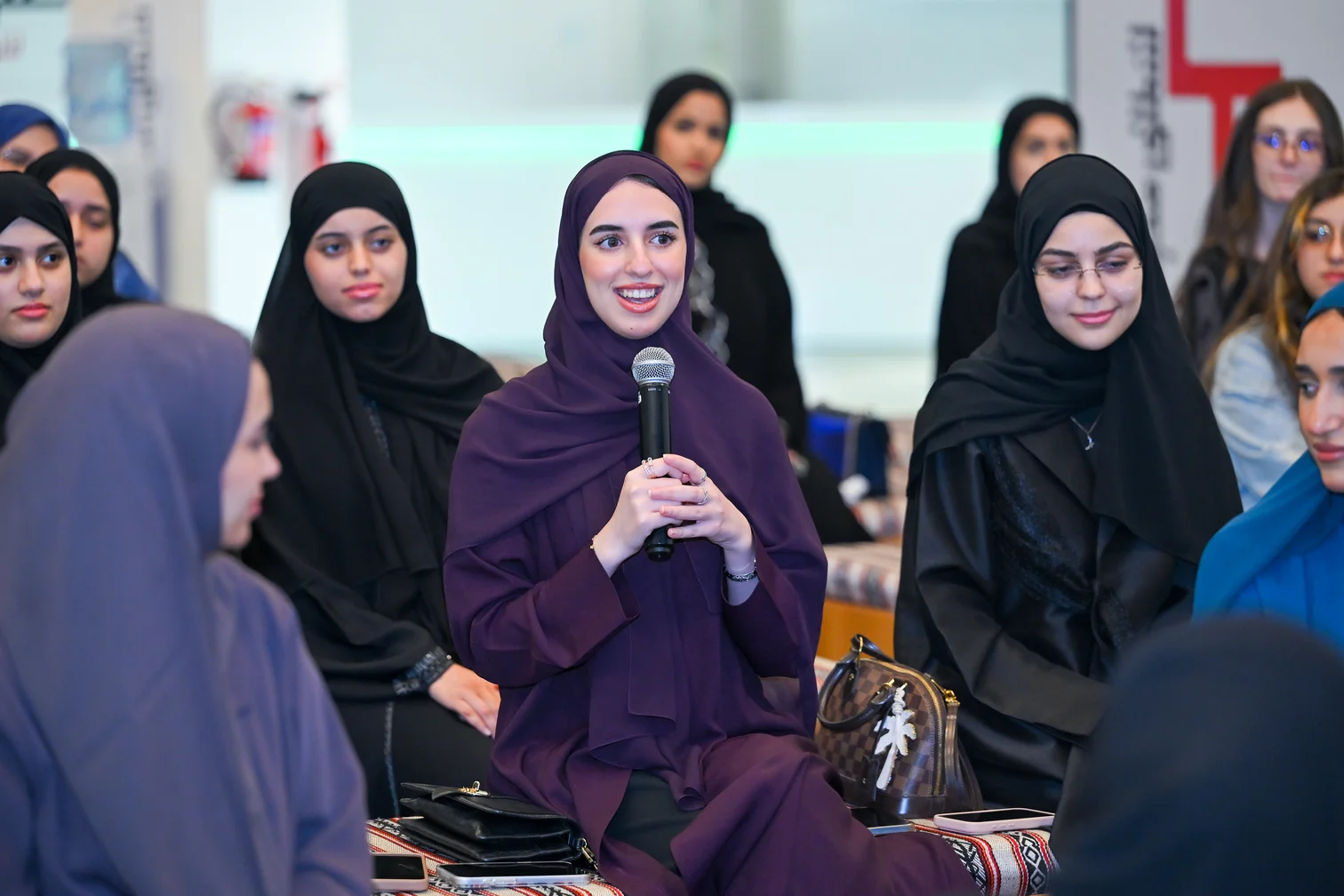 Khalifa University student mentee sharing her experience at the Athar mentoring program closing ceremony