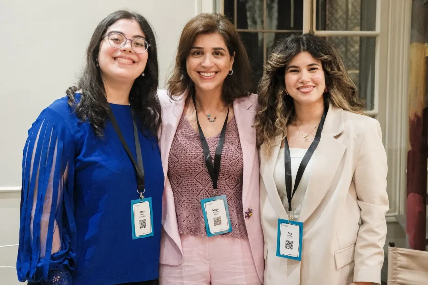 Impactiv team members wearing event lanyards at a mentorship programme session