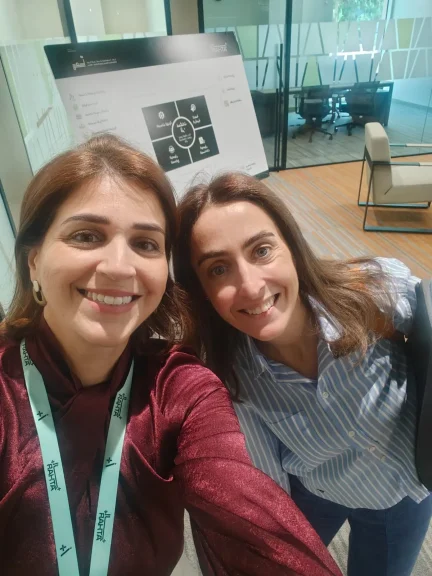 Two Impactiv team members at a workshop venue