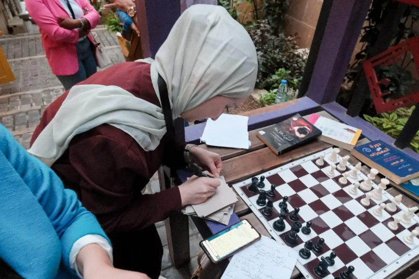 Intersection program talent showcase with chess and reading at the Intersection 5.0 gathering